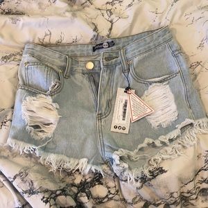 Distressed light wash jean shorts